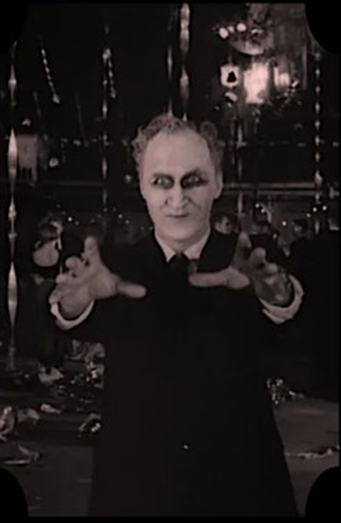 Carnival of Souls movie frame with man with arms extended